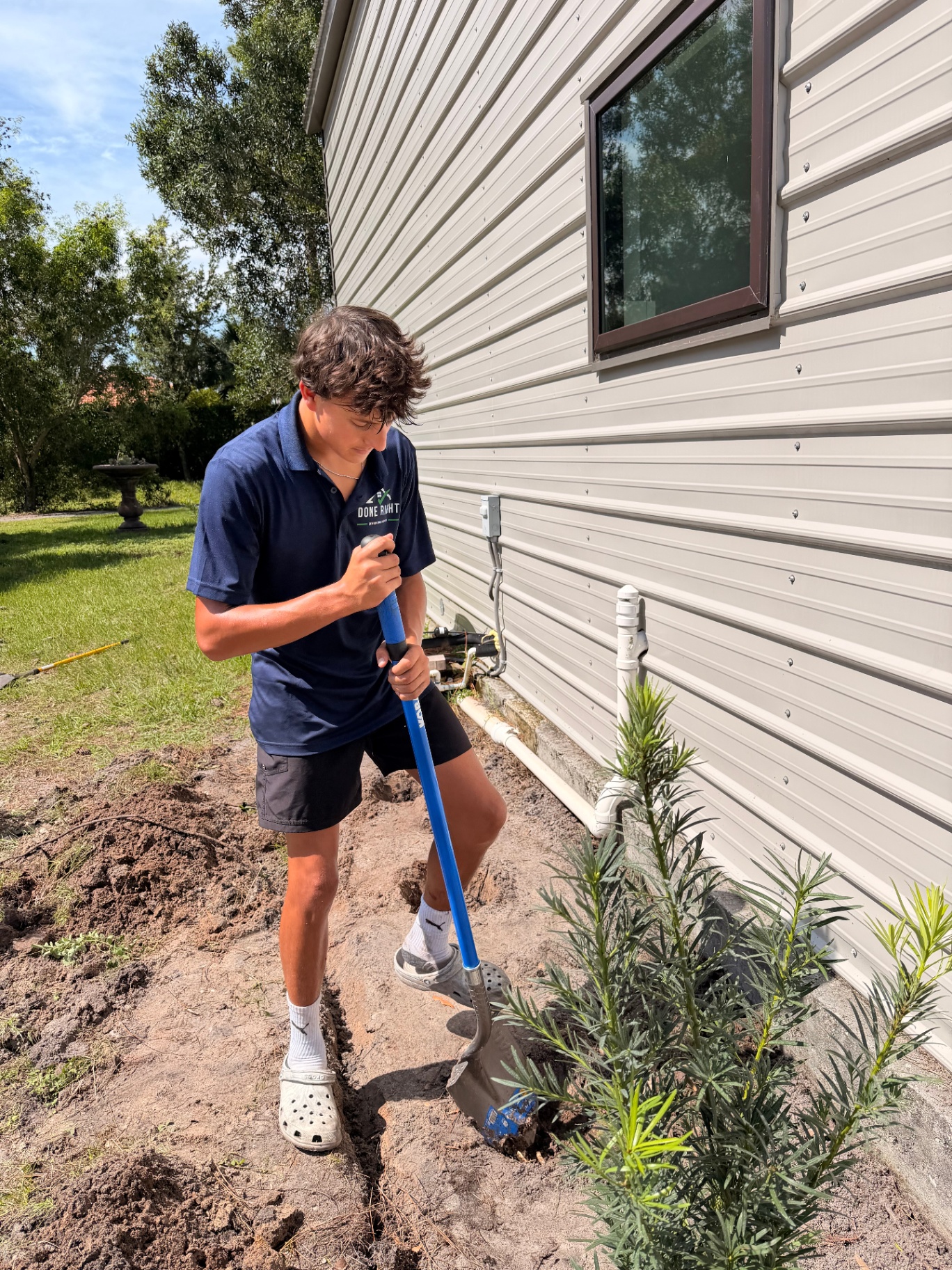 Done Right Home Works performing planting and landscape bed work